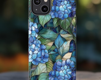 May include: A smartphone case featuring a stained-glass design of blue hydrangea flowers and green leaves. The case has a glossy finish and a dark camera module. The floral pattern is detailed and covers the entire back of the phone case.
