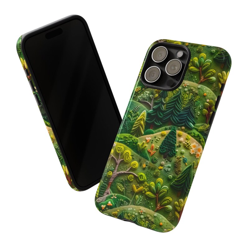 May include: A green, black and white phone case with a whimsical, textured design of a forest scene. The case features a raised, 3D-like design of trees, hills and flowers.