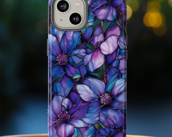 May include: Purple and blue floral phone case with a stained glass design.