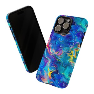 May include: Two smartphones with matching cases. The cases feature a vibrant, abstract design with swirling patterns in shades of blue, purple, yellow, and pink. The phones have black screens and black borders.