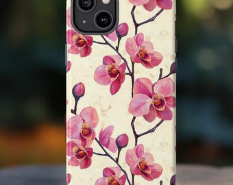 May include: A phone case featuring a floral design of pink orchids on a cream-colored background. The orchids are in full bloom and in bud, with dark brown stems. The case has a glossy finish and a camera cutout.