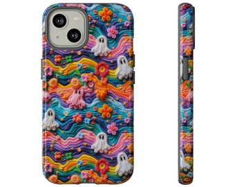 May include: A colorful phone case with a rainbow wave pattern and white ghost figures. The case is made of a textured material and has a raised design.
