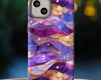 May include: A phone case with a stained glass design. The case features a pattern of wavy lines in shades of purple, blue, and gold, with a starry night effect. The case is designed to fit a smartphone.