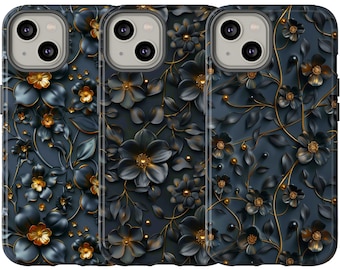 May include: Three phone cases featuring a floral pattern. The cases are dark blue with black and gold flowers, leaves, and vines. The flowers have gold centres and the leaves have gold accents. The cases have a glossy finish.