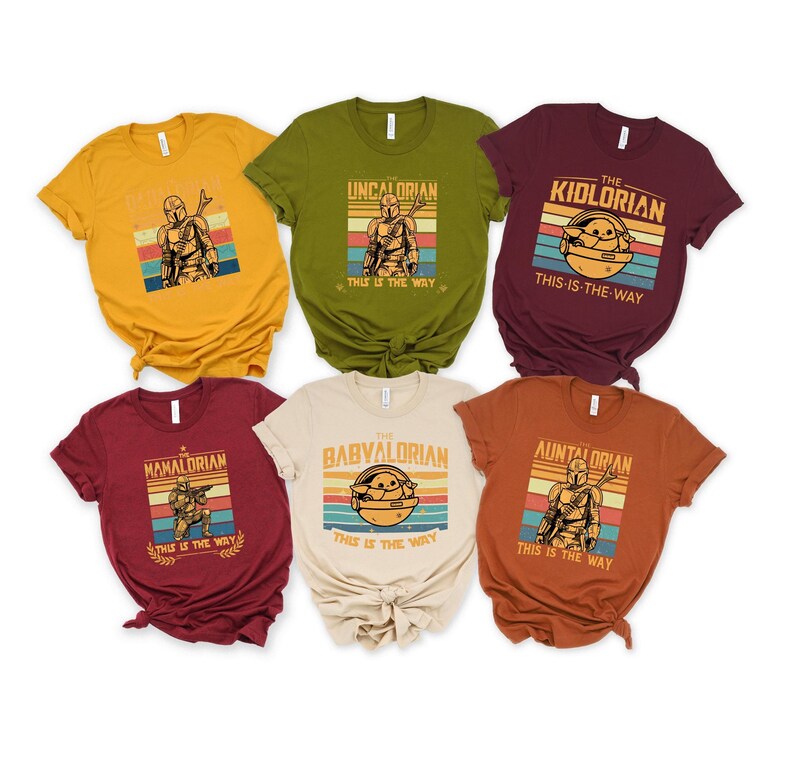 Retro Mandalorian-themed graphics with "This is the Way" text on colorful t-shirts.