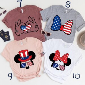 Patriotic Mickey and Minnie designs featuring American flag patterns on t-shirts.