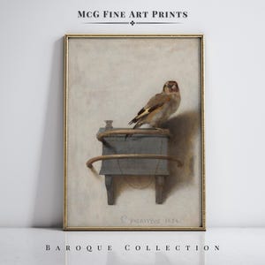 May include: Framed art print featuring a detailed painting of a bird perched on a small, weathered, gray structure. The artwork is set against a neutral background and includes the text "MCG FINE ART PRINTS" and "BAROQUE COLLECTION".