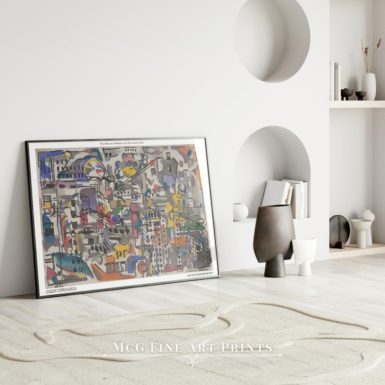 May include: A colorful abstract painting of a city scene. The painting is done in a style reminiscent of cubism, with geometric shapes and overlapping forms. The colors are bright and vibrant, and the overall effect is one of energy and movement. The title of the painting is "The Mystery of Matisse in New York, 1919" by Joaquin Torres-Garcia.