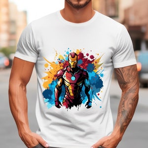 May include: White t-shirt with a colorful graphic of Iron Man in a superhero pose with a red, yellow, and blue paint splatter background.