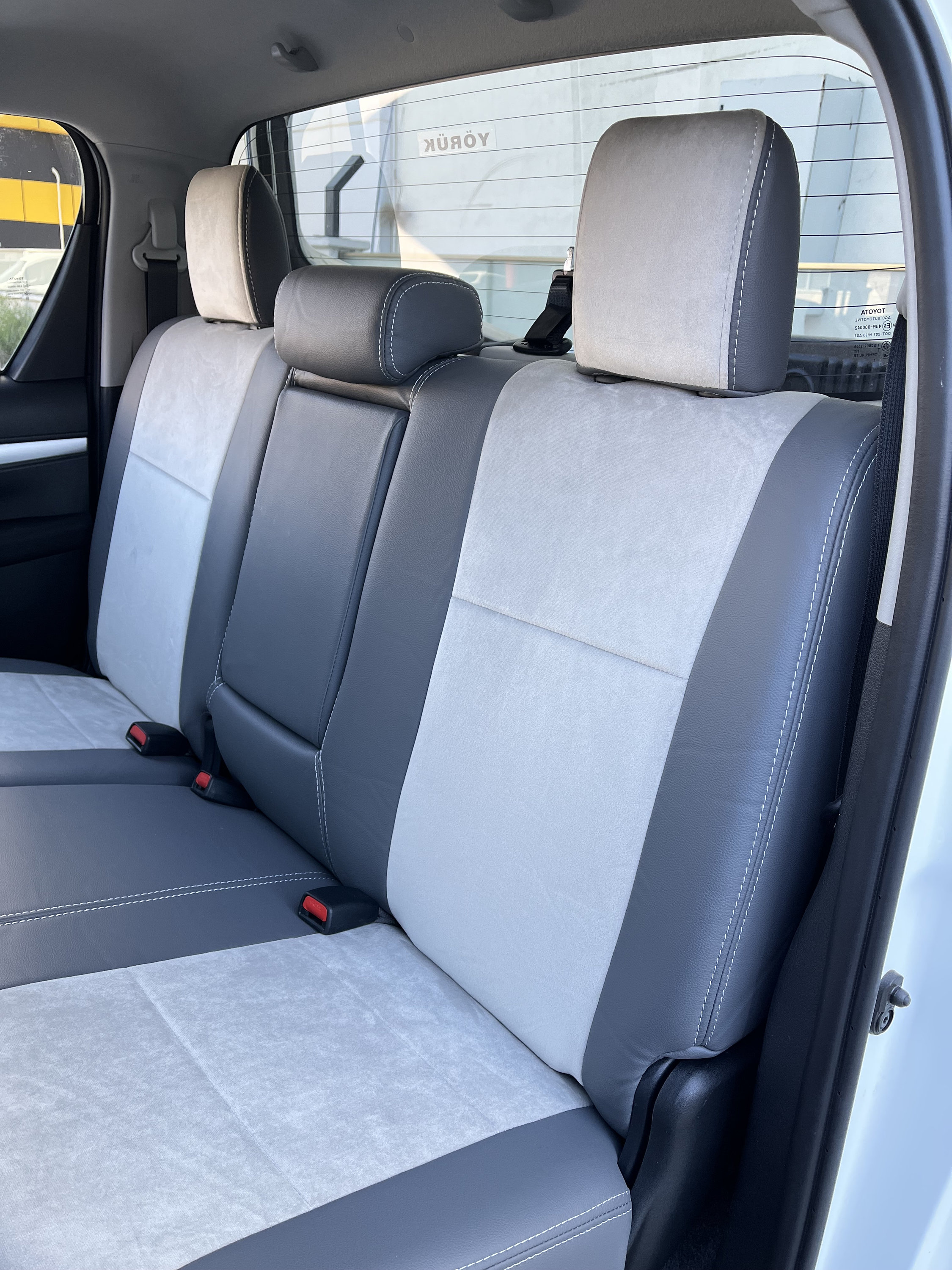 UK Custom Covers Toyota Hilux Icon/Invincible 2016+ Rear Seat Covers – Black (Tailored, RHD)