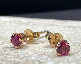 Aretes de oro macizo de 14 quilates con topacio rosa