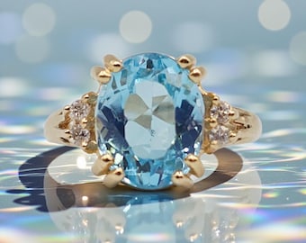 Solid 14K Yellow Gold Ring with Blue Topaz and Diamond Accents – Size 7.25