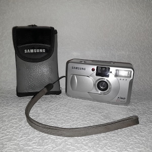 Vintage Samsung Fino 15 DLX-camera: verzamelobject jaren 90 met originele tas