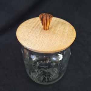 Vintage preserving jar with turned lid and handle made of maple and zebrano