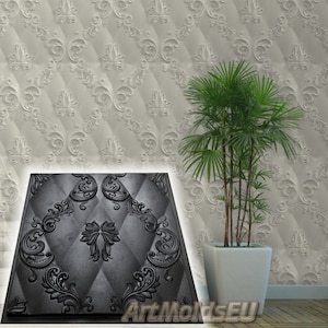 Könnte beinhalten: Eine schwarze Silikonform mit einem dekorativen, verzierten Design. Die Form ist quadratisch und weist ein sich wiederholendes Muster aus floralen und geometrischen Formen auf. Die Form befindet sich auf einem weißen Hintergrund mit einem ähnlichen Design.