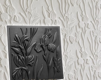 May include: A square black silicone mold featuring a raised relief design of iris flowers and leaves. The mold is positioned against a white background displaying a matching embossed pattern of the same iris floral motif, with the text ArtMoldsEU.
