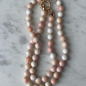 Queen Conch Shell Hand Knotted Necklace - 6mm natural Queen Conch Shell knotted on pink silk; 14k gold filled mariner clasp