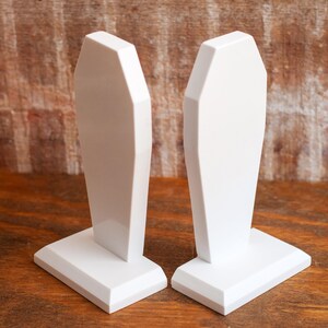 front view of a pair of gothic bookend coffin shaped book holder for table, bookshelf, or book case
