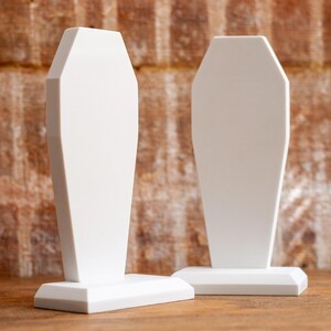 front view of a pair of gothic bookend coffin shaped book holder for table, bookshelf, or book case