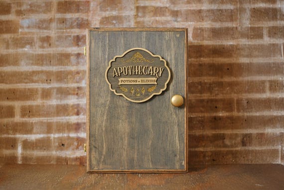 A reclaimed-wood apothecary cabinet with hand-fitted glass vials and bottles — the kind of artisan storage piece that becomes a room's focal point, 53 favorites back it up.