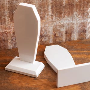 top down view of a pair of gothic bookend coffin shaped book holder for table, bookshelf, or book case