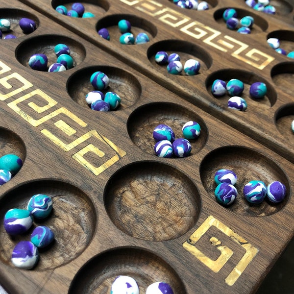 Walnut Aztec themed mancala board