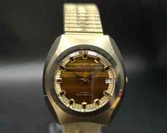 Orologio da polso automatico vintage Techonos Tiger Borazon, 25 rubini, fabbricato in Svizzera.