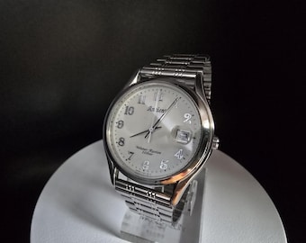 Vintage rare QRTZ RICOH Ancient watch , model 70s , classic , JAPAN made , saphire glass .