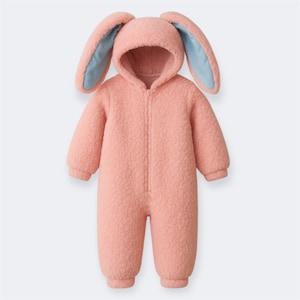 May include: A pink, plush baby jumpsuit with a hood and attached bunny ears. The inside of the ears is light blue. The jumpsuit has a full-length zipper and covers the arms and legs.