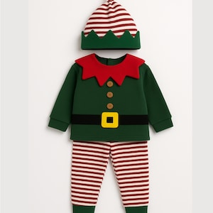 May include: A green elf costume set with a matching hat and striped pants. The long-sleeved top has a red collar, brown buttons, and a black belt with a yellow buckle. The hat and pants feature red and white stripes.