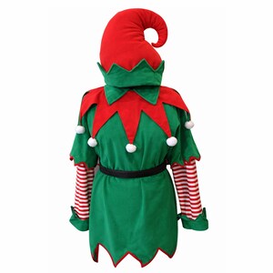 May include: Green elf costume with a red collar and hat. The costume features red and white striped sleeves, white pom-poms, and a black belt. The hat has a curled tip.