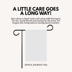 May include: A white garden flag on a black metal stand. The flag has the text "A LITTLE CARE GOES A LONG WAY!" and care instructions. The bottom of the flag reads "JOYFUL JOURNEY USA".
