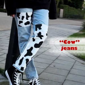 Jeans "Cow" personalizados. Pantalones personalizados. Jeans pintados con diseño floral. Pantalones de mezclilla personalizados.