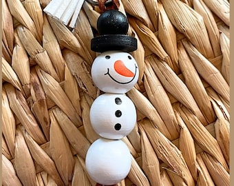 Handmade Beaded Snowman Keychain: Christmas Charm with Tassel