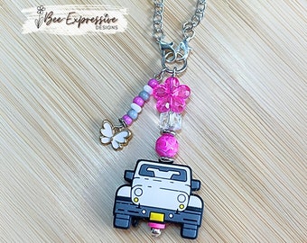 Handmade, white 4x4 vehicle charm chain for a tumbler!  Acrylic beads, lobster claw clasps, flower, beaded tassel, white butterfly charm!