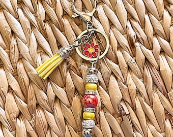 Handmade Beaded Keychain: Iridescent Beads, Red Daisy Charm