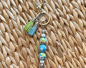 Handmade Beaded Keychain: Acrylic Star Bead, Daisy Charm, Tassel Accent