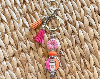 Such a colorful, handmade, DUNKIN DONUTS keychain! Lobster claw clasp, metal bar, silicone beads and rhinestone spacers, tassels