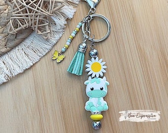 Handmade Turquoise Cow Keychain: Beaded Tassel with Butterfly Charm