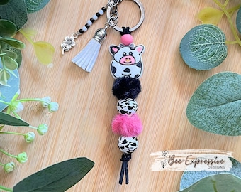 Handmade Cow Keychain: Furry & Wood Beads, Acrylic Tassel, Metal Flower Charm