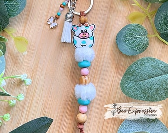 Handmade Cow Keychain: Beaded Tassel, Butterfly Charm