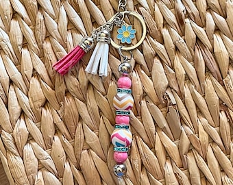 Handmade Beaded Keychain: Iridescent Beads, Daisy Charm, Tassel Accent