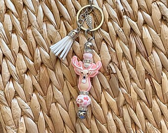 Unique, DEER keychain!  Lobster clasp, beaded bar, silicone deer head, animal print bead,