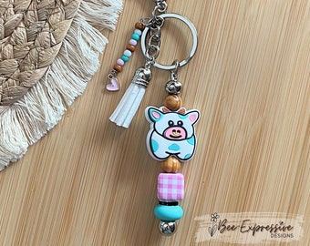 COW, BULL, beaded keychain! Lobster or swivel clasp, wood beads, gingham square bead, beaded tassel with pink heart charm!