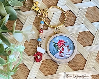 Handmade, Christmas Gnome Cabochon Keychain: Beaded tassel, Small mitten charm