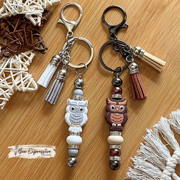 Beautiful, handmade, brown or white silicone owl keychains! Lobster clasp on metal bar, rhinestone spacers, tassel, black or silver