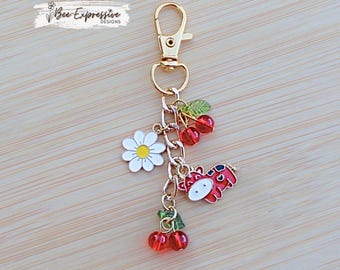 Handmade, Cherries, Charm Chain: Red Cow Charm, White Daisy Charm