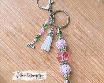 Handmade Floral Keychain: Acrylic Hexagon, Wood Flower Beads, Tassel and Love Charm