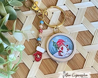Handmade, Christmas Gnome Cabochon Keychain: Beaded tassel, Small mitten charm