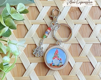 Handmade, Christmas Gnome Cabochon Keychain: Beaded tassel, Christmas tree metal charm